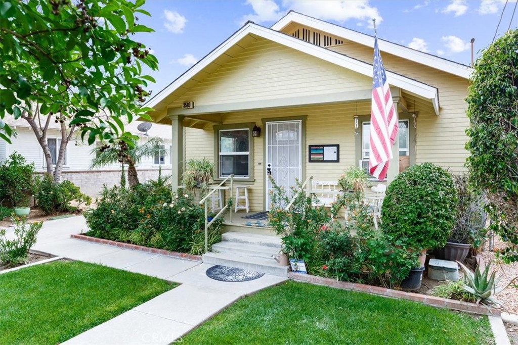 3580 Harding Street Riverside, CA 92506 - Photo 1 of 1 a front view of a house with garden