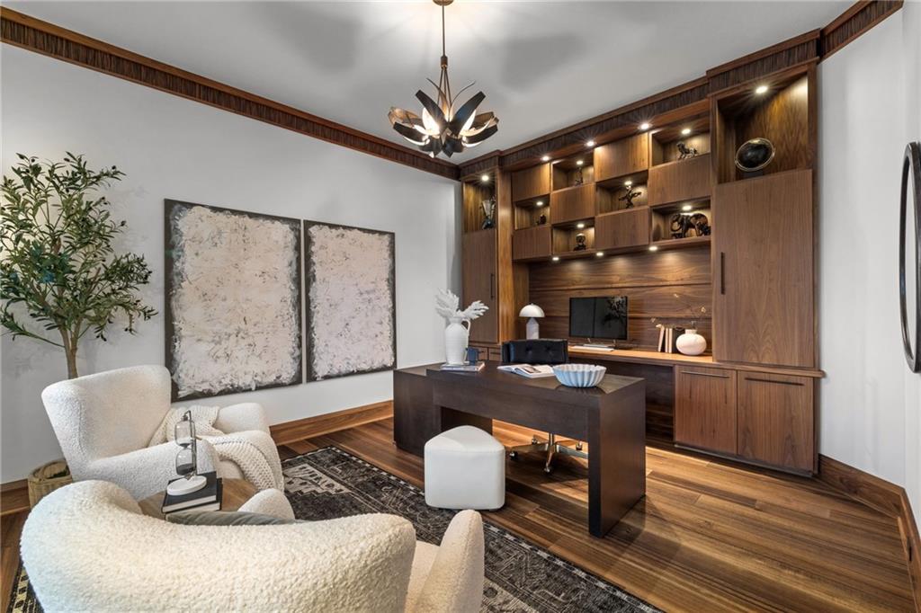 10485 Grubbs Road Wexford, PA 15090 - Photo 21 of 50 The home's study impresses with ·Hubbardton Forge light fixtures, custom walnut built-ins, and custom zebra wood crown molding.