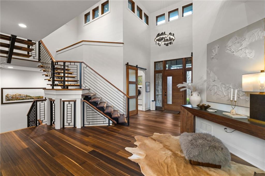 10485 Grubbs Road Wexford, PA 15090 - Photo 3 of 50 Not detail left untouched. Two-story entry leads into the two-story great room - accented by a Hubbardton Forge Ardesia series chandelier