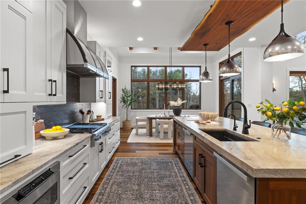 10485 Grubbs Road Wexford, PA 15090 - Photo 9 of 50 The island features two dishwashers and Armina Stone, Allure Leather Quartzite countertop