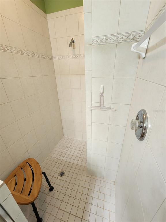 400 Ravinia Circle, Unit 400 Venice, FL 34292 - Photo 25 of 31 a bathroom with a shower