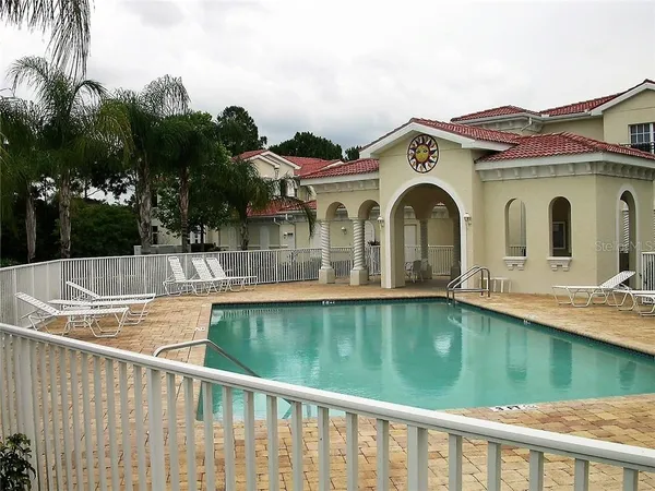 a view of a house with a swimming pool