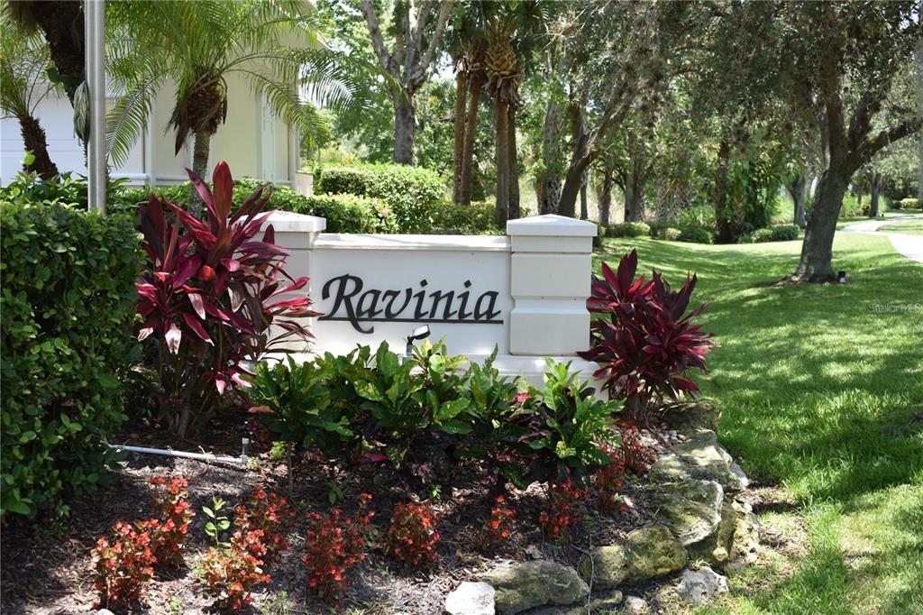 400 Ravinia Circle, Unit 400 Venice, FL 34292 - Photo 31 of 31 a view of a sign in a yard with plants and trees