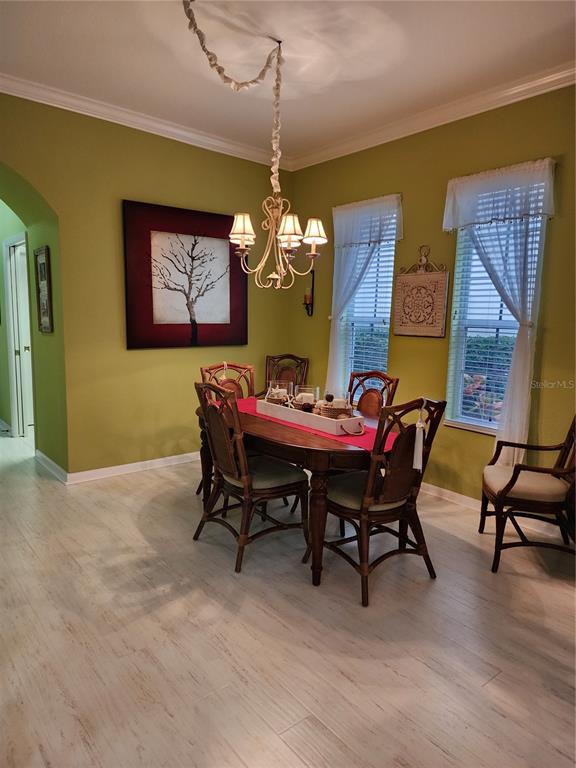 400 Ravinia Circle, Unit 400 Venice, FL 34292 - Photo 9 of 31 a dining room with furniture and window