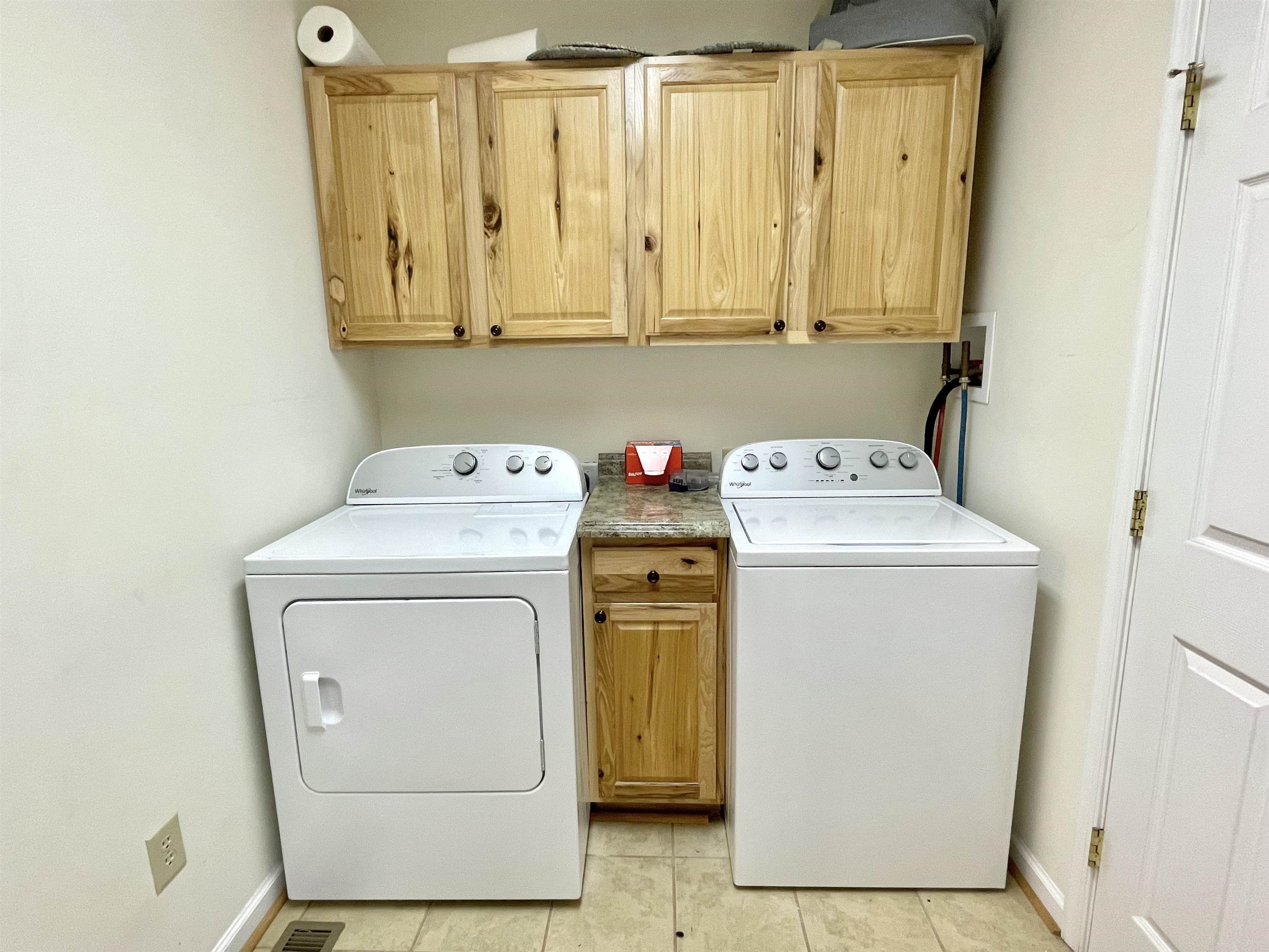 224 Dooms Crossing Road Waynesboro, VA 22980 - Photo 14 of 16 a utility room with dryer and washer