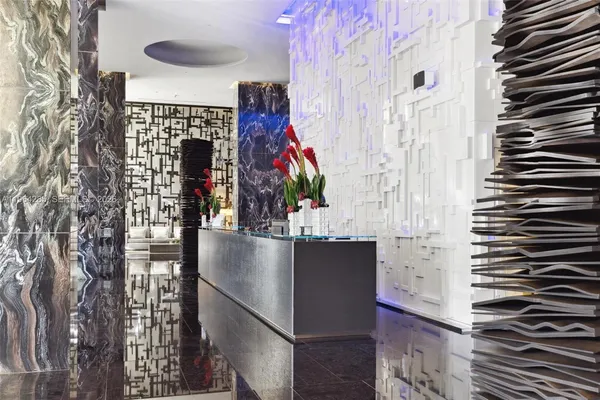 a patio with a table and chairs