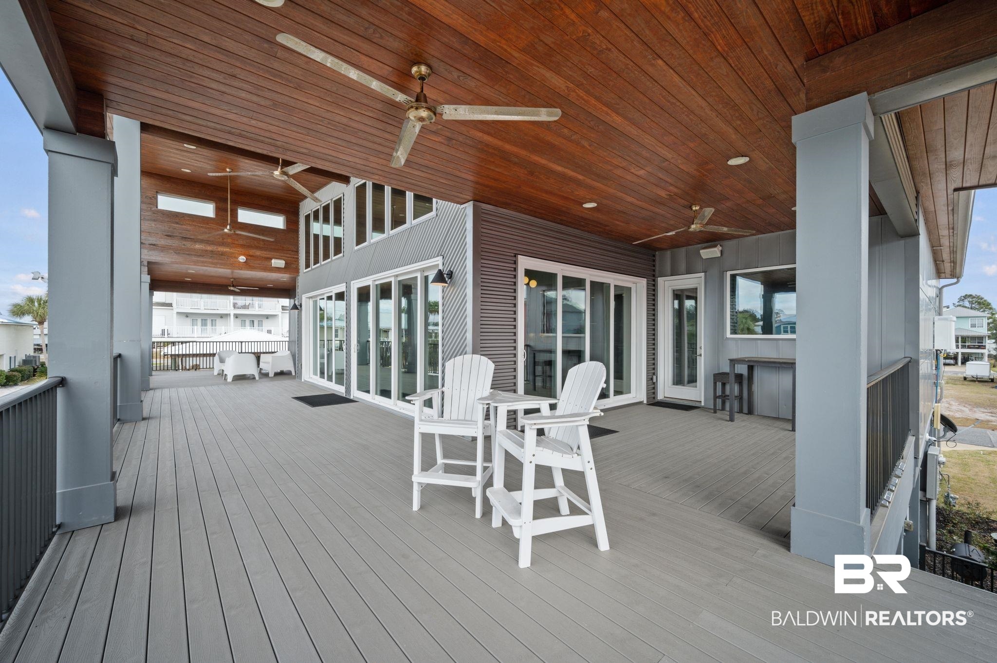 3840 Cotton Way Orange Beach, AL 36561 - Photo 40 of 75 Wooden deck with ceiling fan