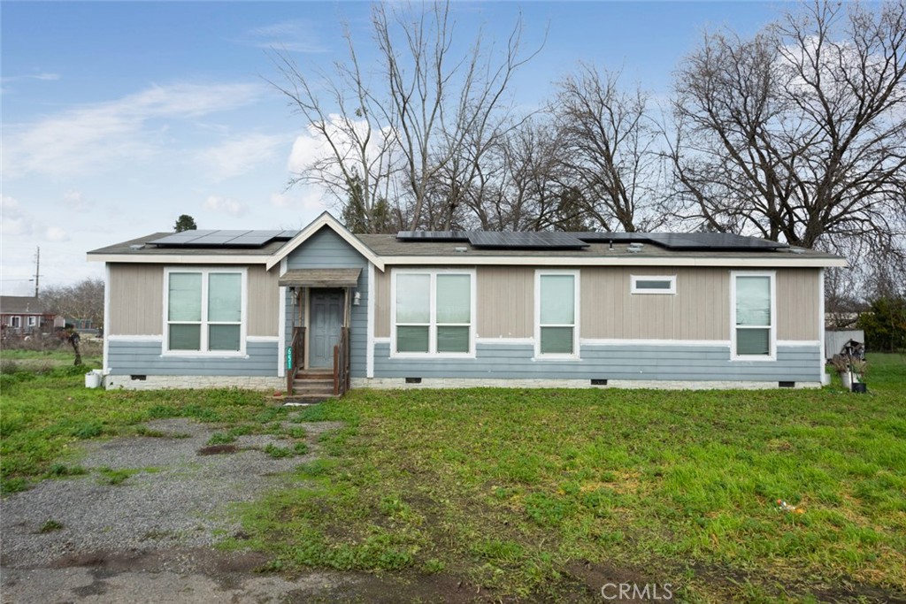 651 Ord Ranch Road Biggs, CA 95917 - Photo 1 of 1 front view of a house with a yard
