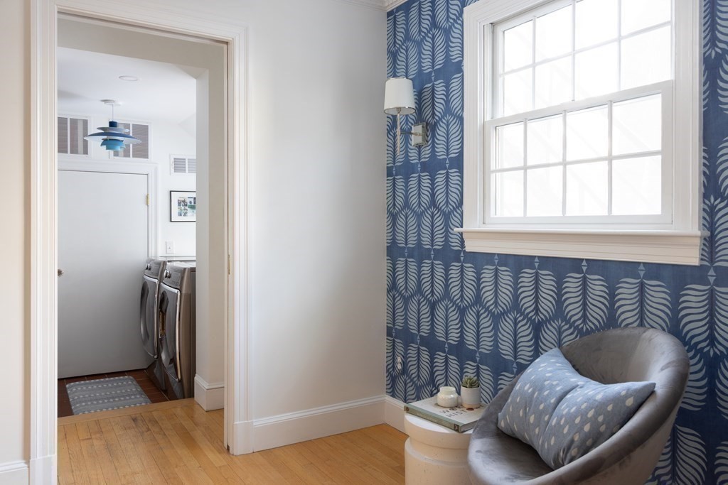 208 South Street Brookline, MA 02467 - Photo 12 of 30 a living room with furniture and a window