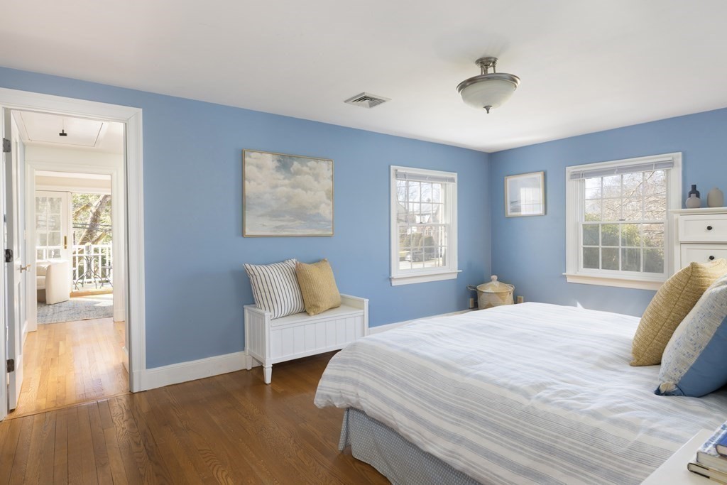 208 South Street Brookline, MA 02467 - Photo 14 of 30 a bedroom with a bed and wooden floor