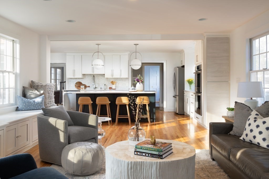 208 South Street Brookline, MA 02467 - Photo 2 of 30 a living room with furniture and kitchen view
