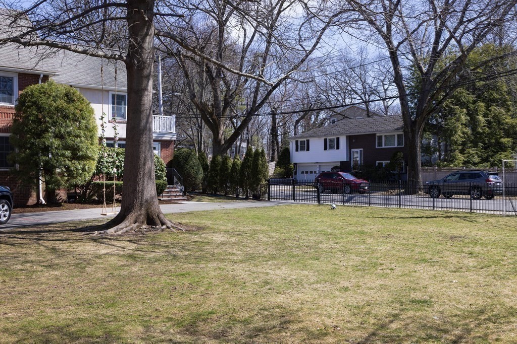 208 South Street Brookline, MA 02467 - Photo 27 of 30 a view of a house with swimming pool and a tree
