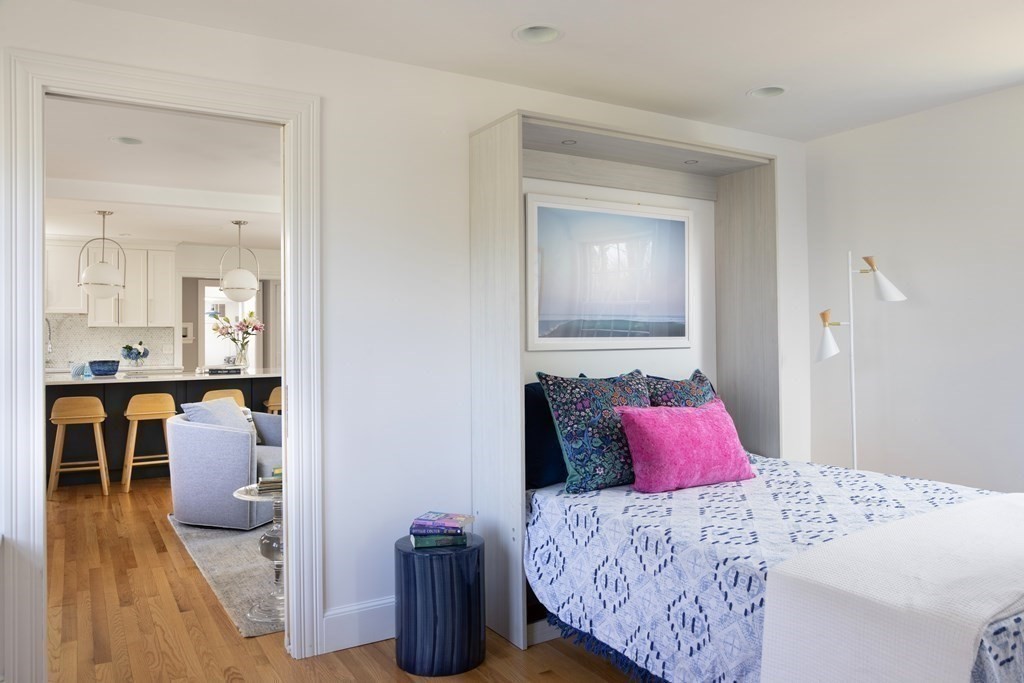 208 South Street Brookline, MA 02467 - Photo 7 of 30 a bedroom with a bed and a view of bathroom