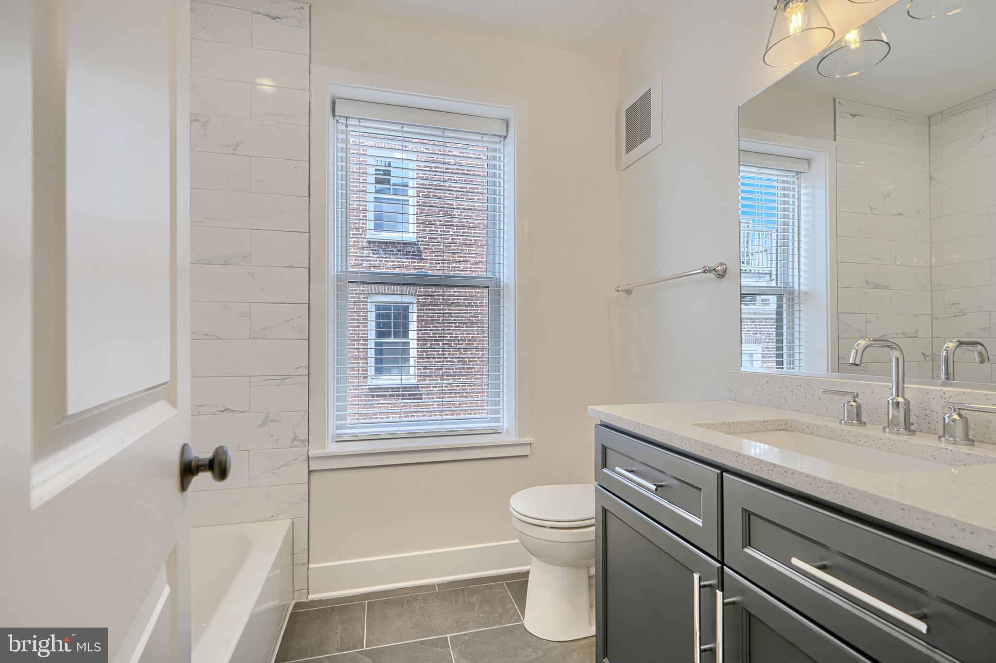 2229 Bank Street Baltimore, MD 21231 - Photo 21 of 47 Front Bathroom