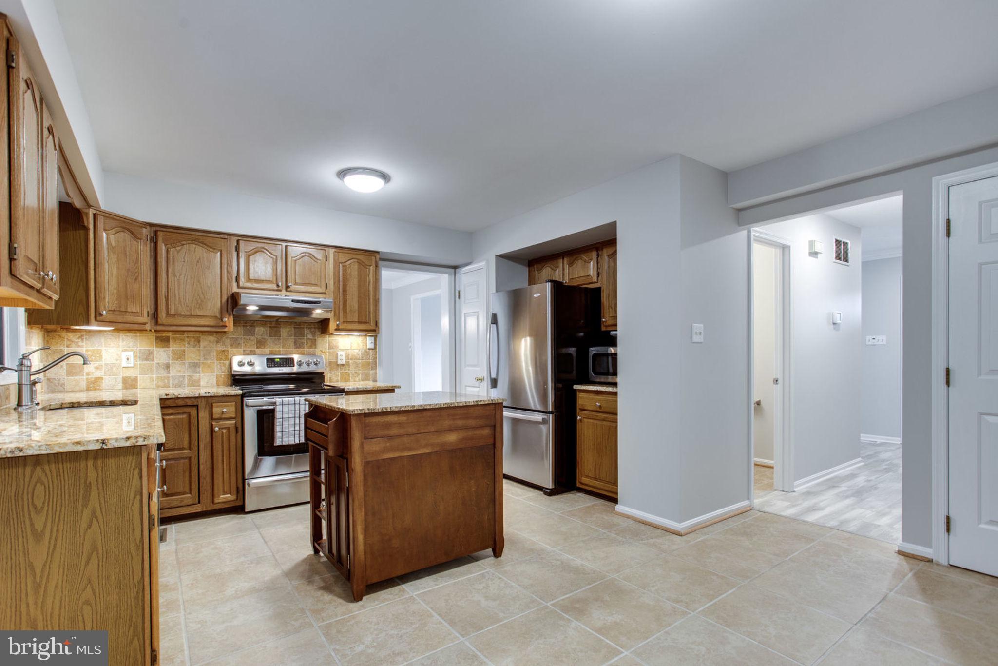 6948 Fox Chase Road New Market, MD 21774 - Photo 17 of 62 Kitchen with Granite Countertops