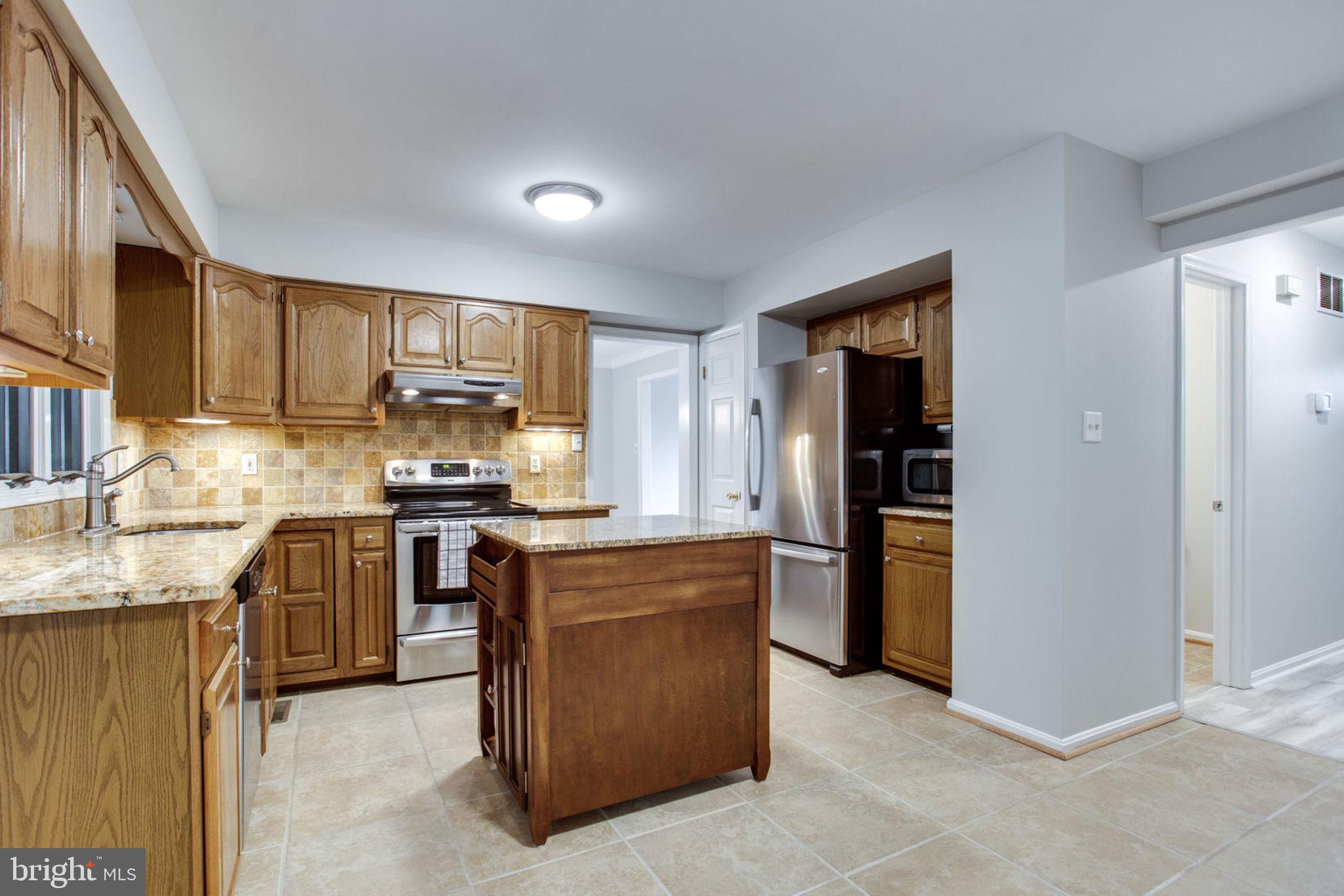 6948 Fox Chase Road New Market, MD 21774 - Photo 18 of 62 Kitchen with Granite Countertops