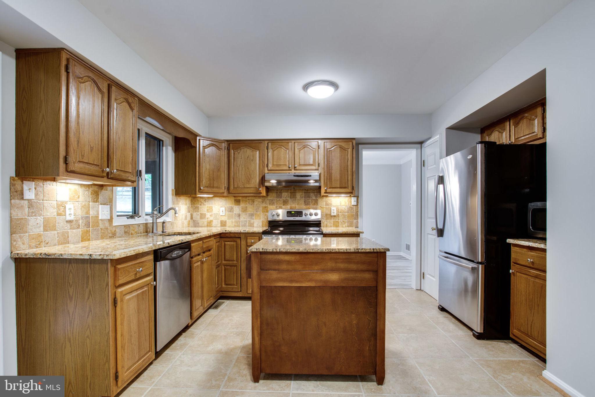 6948 Fox Chase Road New Market, MD 21774 - Photo 19 of 62 Kitchen with Granite Countertops