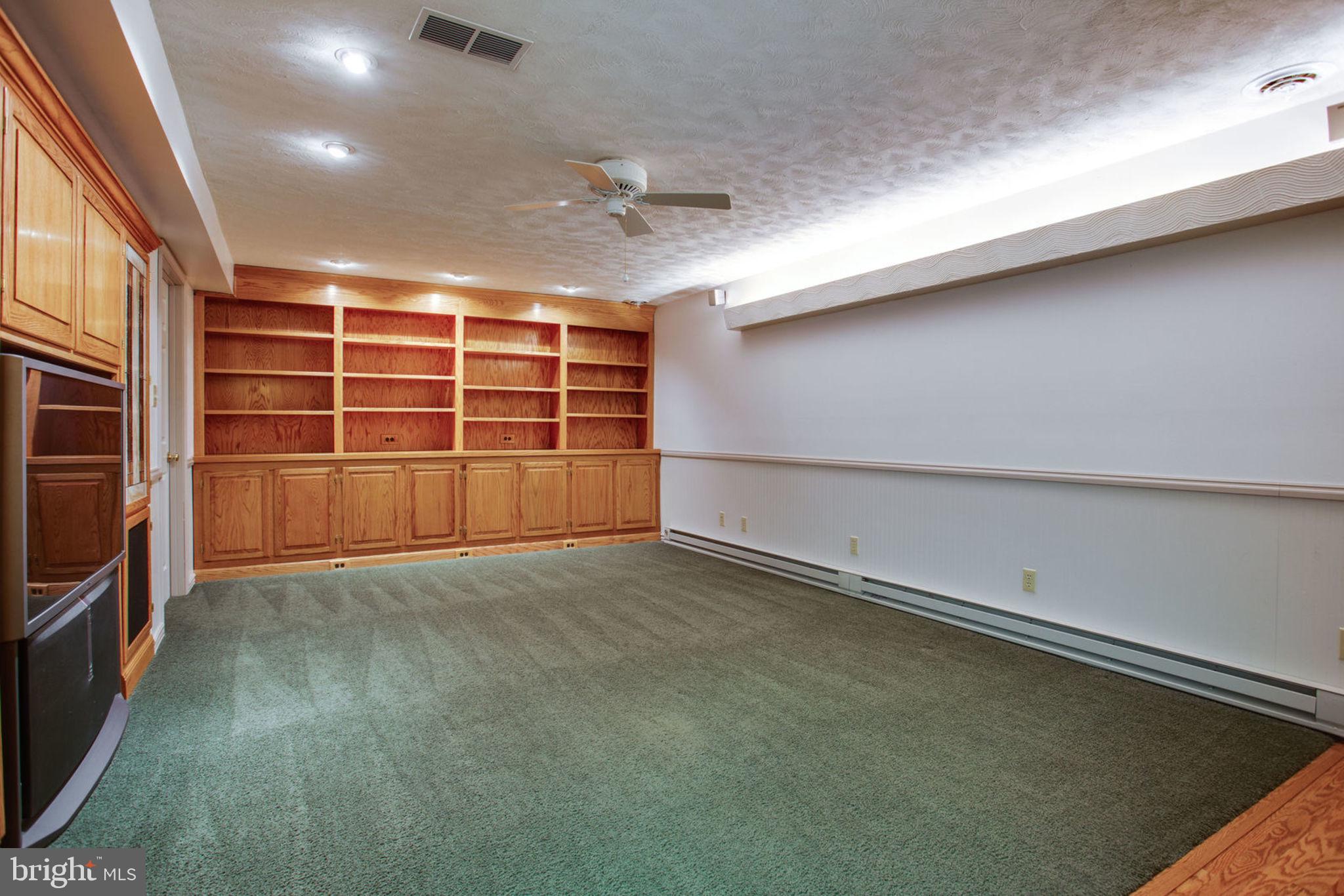 6948 Fox Chase Road New Market, MD 21774 - Photo 37 of 62 Finished Lower Level w/ Built Ins