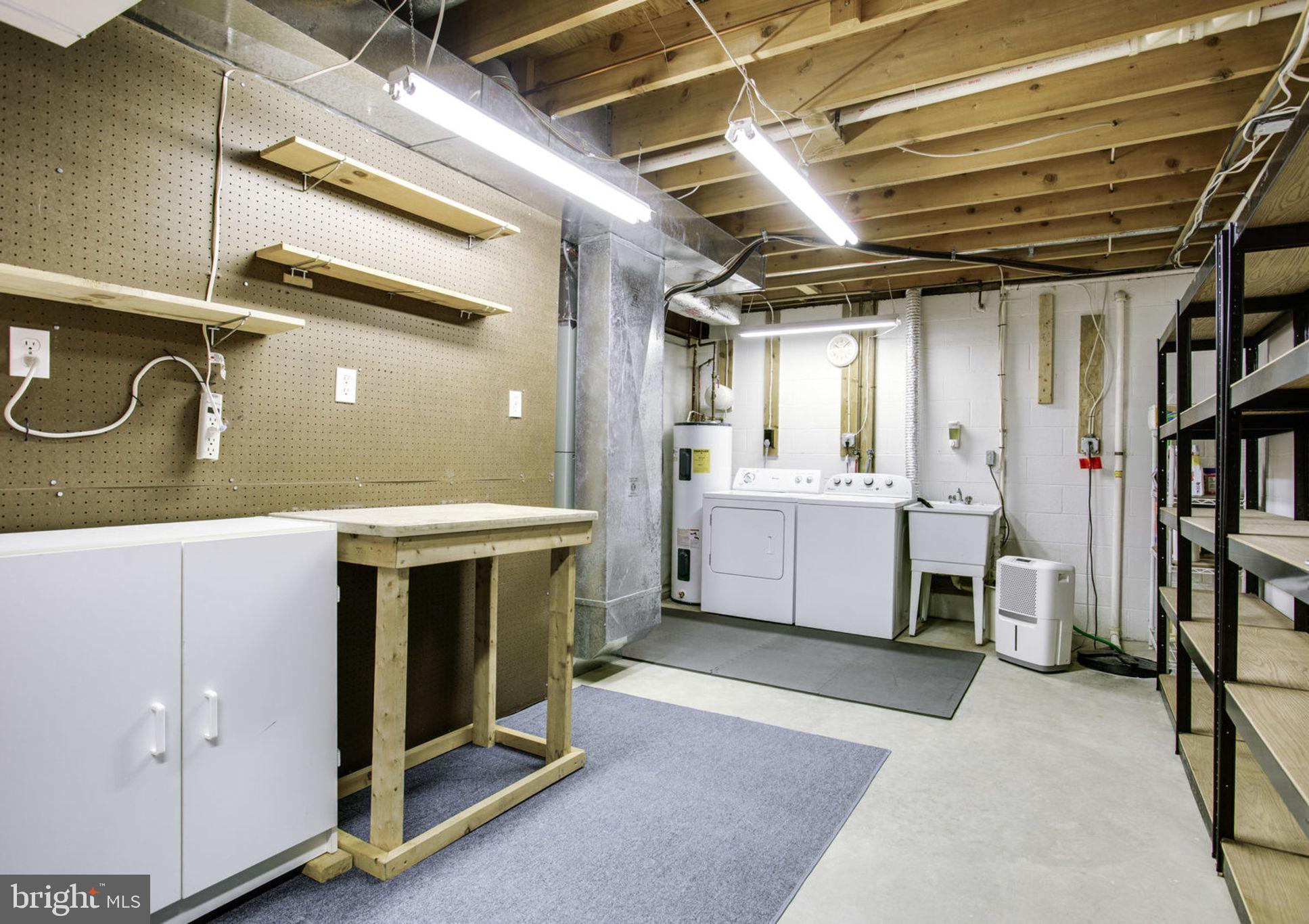 6948 Fox Chase Road New Market, MD 21774 - Photo 41 of 62 Laundry Area with Plenty of Storage Space