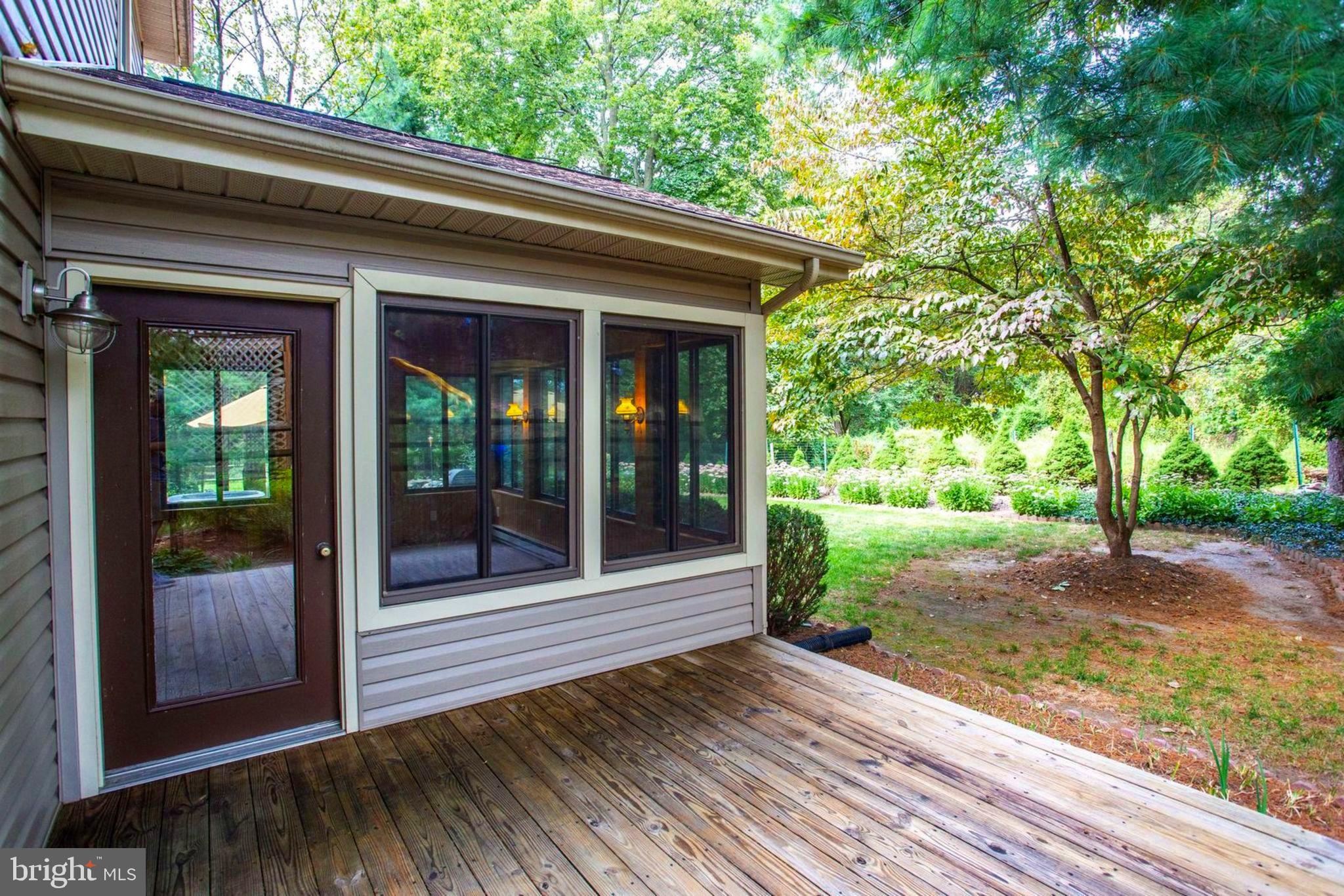 6948 Fox Chase Road New Market, MD 21774 - Photo 42 of 62 Rear Deck off 3 Season Room