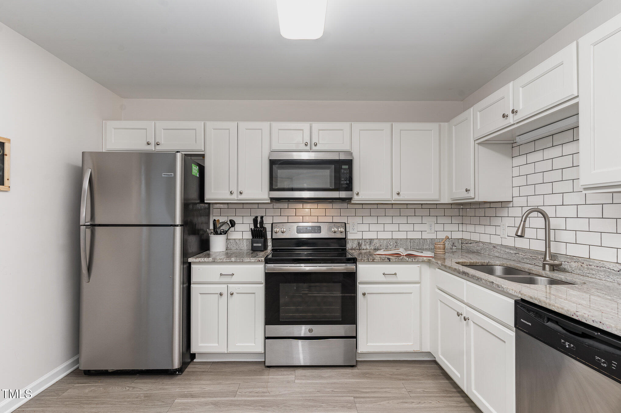 2627 Dwight Place Raleigh, NC 27610 - Photo 5 of 21 Refrigerator Conveys!