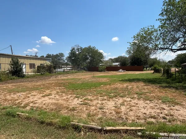 a view of a house with a big yard