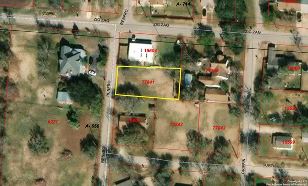 an aerial view of houses and roads