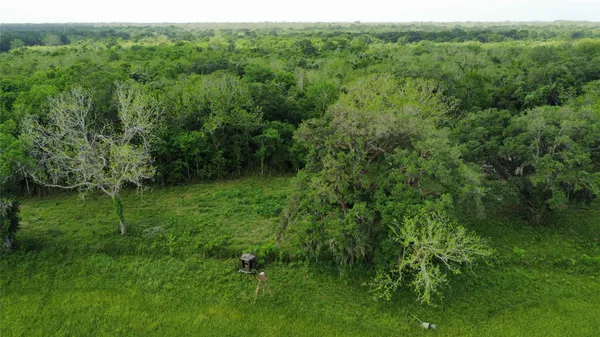 a view of outdoor space with playground and green space
