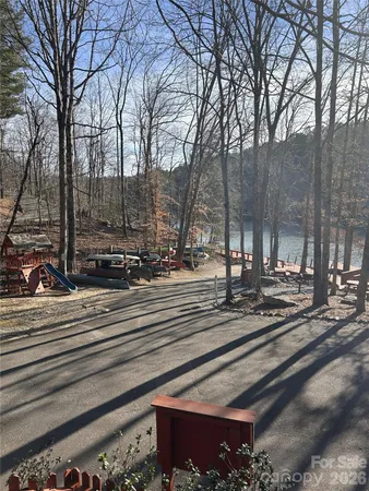 a view of outdoor space with deck and tree