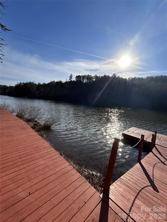 a view of a lake from a balcony