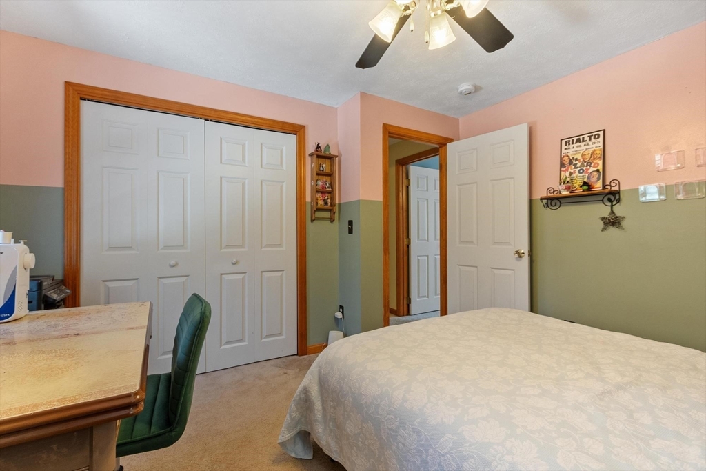 112 Baldwinville State Road Winchendon, MA 01475 - Photo 22 of 42 a bedroom with a bed and ceiling fan