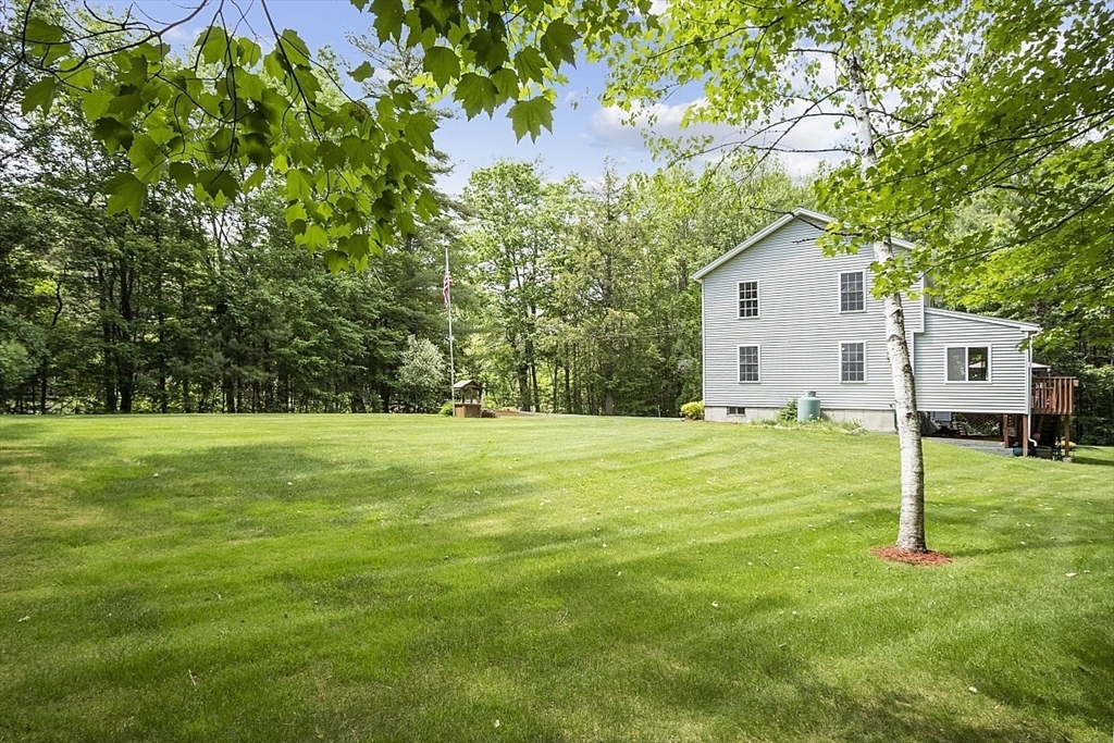 112 Baldwinville State Road Winchendon, MA 01475 - Photo 33 of 42 a view of a house with a backyard