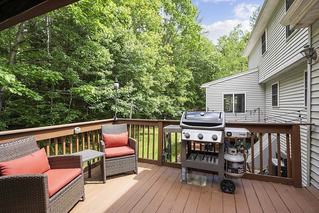 112 Baldwinville State Road Winchendon, MA 01475 - Photo 38 of 42 a view of a deck with couches wooden floor and fence