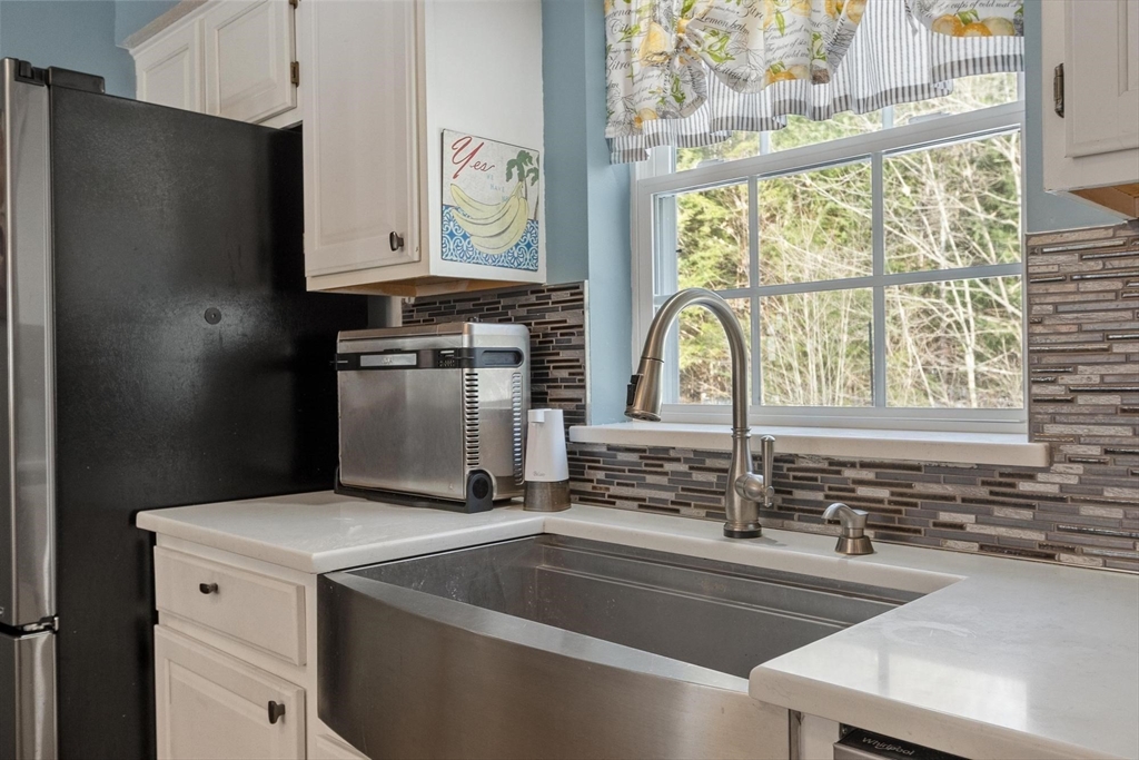 112 Baldwinville State Road Winchendon, MA 01475 - Photo 4 of 42 a kitchen with a refrigerator and a sink