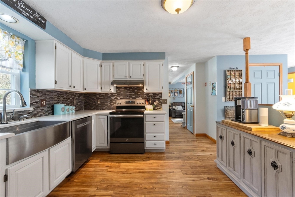 112 Baldwinville State Road Winchendon, MA 01475 - Photo 6 of 42 a kitchen with stainless steel appliances a stove sink and cabinets