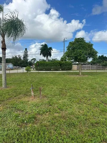 a view of a lake with a big yard