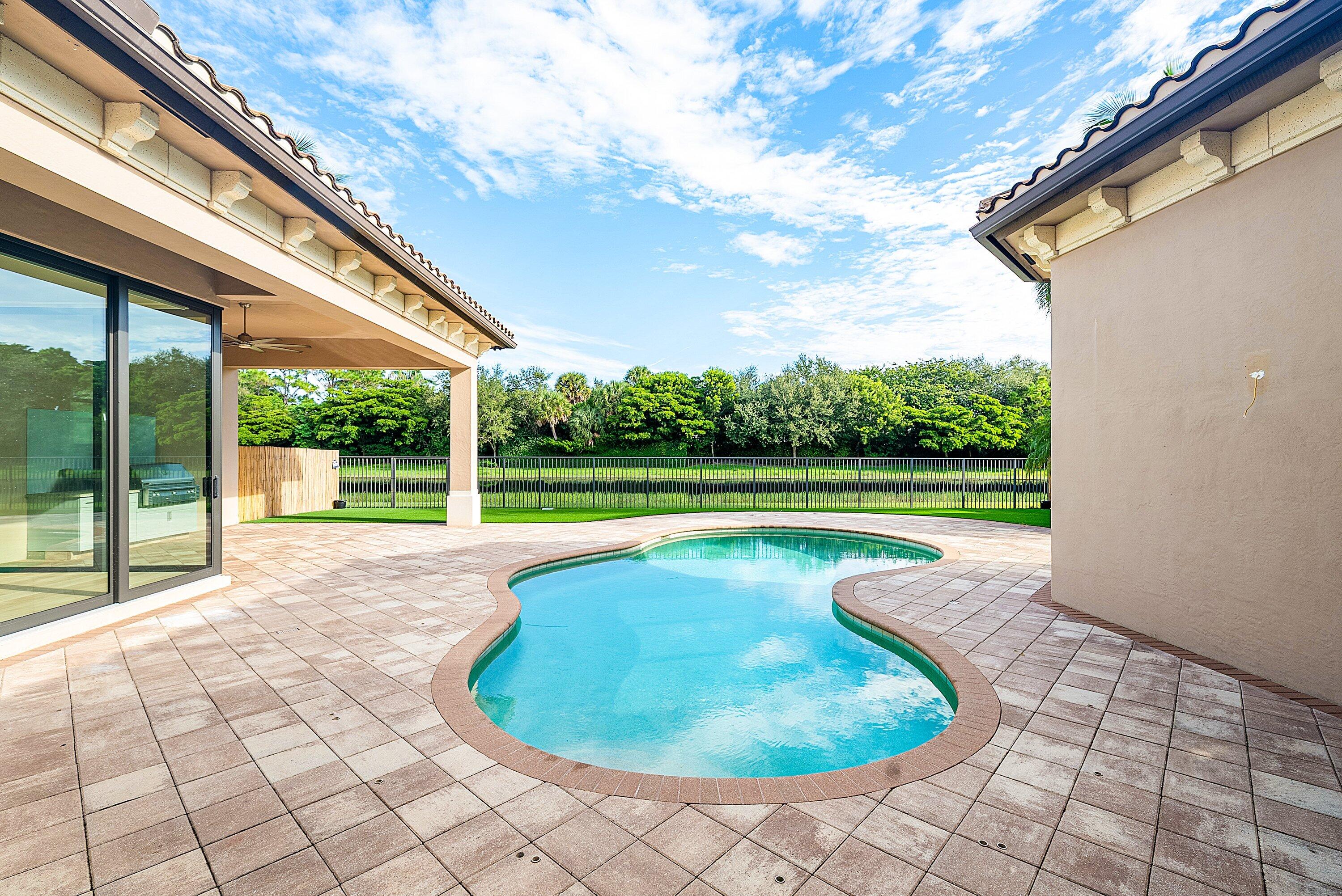 9599 Moritz Way Delray Beach, FL 33446 - Photo 45 of 64 exterior rear