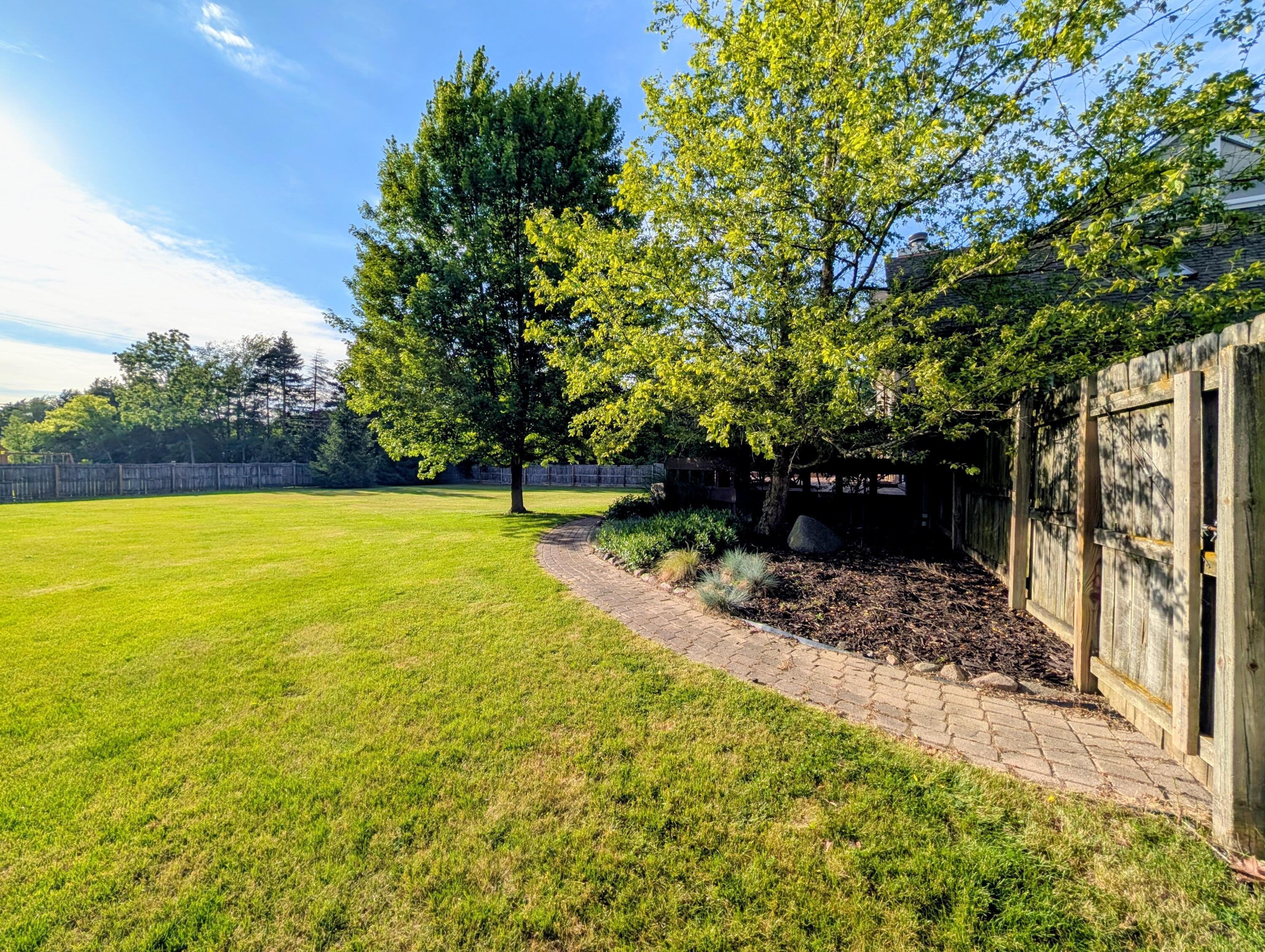 8698 Warner Road Saline, MI 48176 - Photo 70 of 80 Pathway in Fenced Backyard