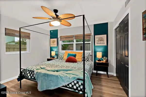 a black and white checkered floor with a black white checkered floor next to a window