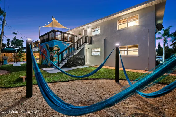 a kitchen with a table and chairs in it