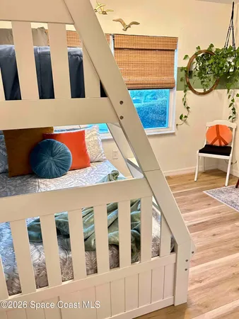a bathroom with a sink mirror vanity and toilet