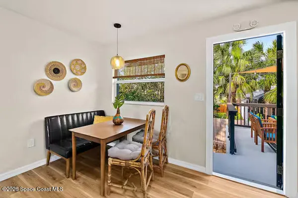 a view of a house with a yard porch and sitting area