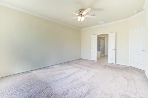 a bath tub sitting next to a shower