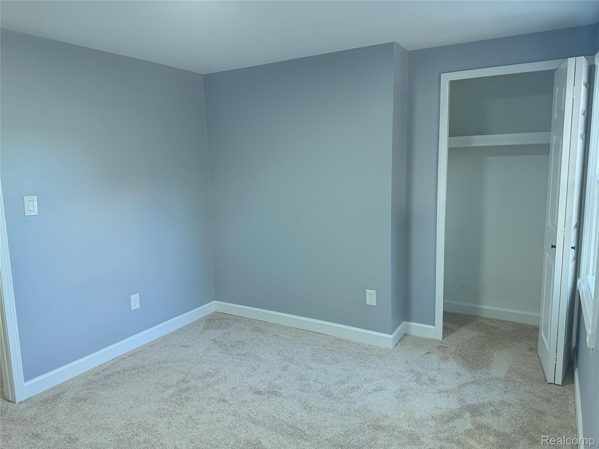 20698 Coachwood Road Riverview, MI 48193 - Photo 32 of 37 Unfurnished bedroom with carpet floors and a closet