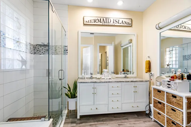 a utility room with sink dryer and washer