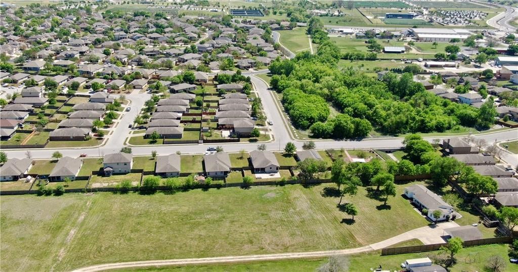 211 Tate Lane Round Rock, TX 78665 - Photo 38 of 40 an aerial view of residential houses with outdoor space