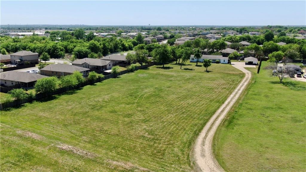 211 Tate Lane Round Rock, TX 78665 - Photo 39 of 40 an aerial view of residential houses with outdoor space and trees