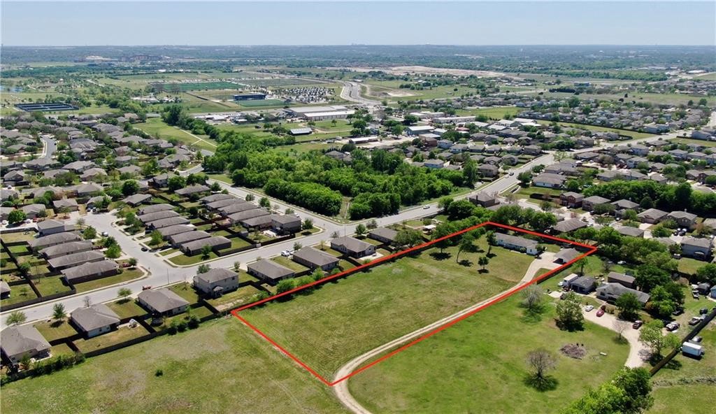 211 Tate Lane Round Rock, TX 78665 - Photo 40 of 40 an aerial view of residential houses with outdoor space