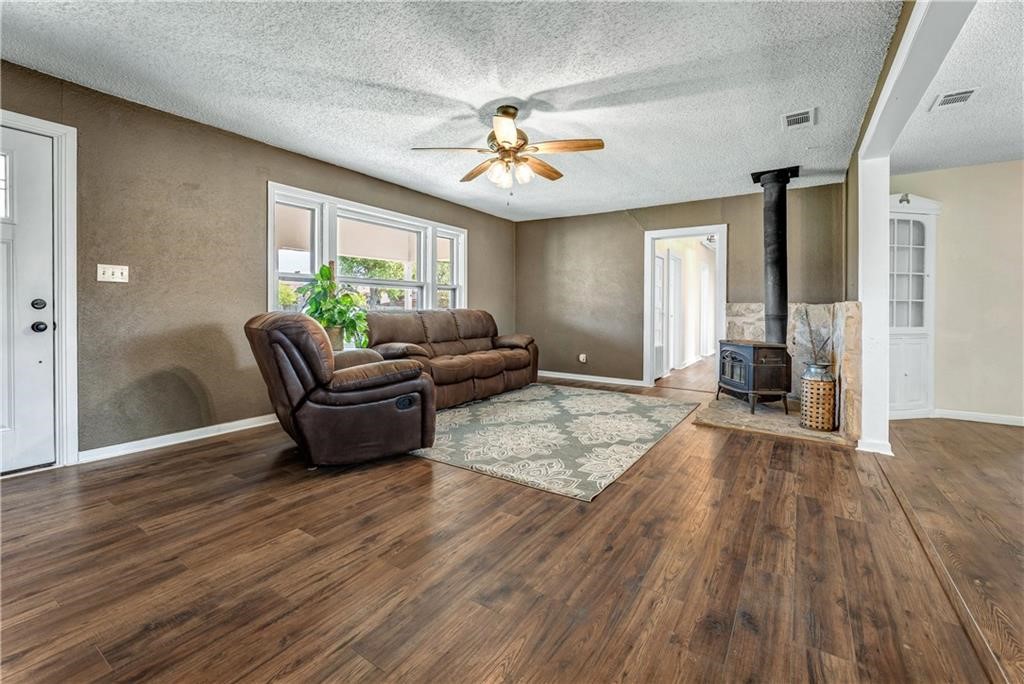 211 Tate Lane Round Rock, TX 78665 - Photo 9 of 40 a living room with furniture and a large window