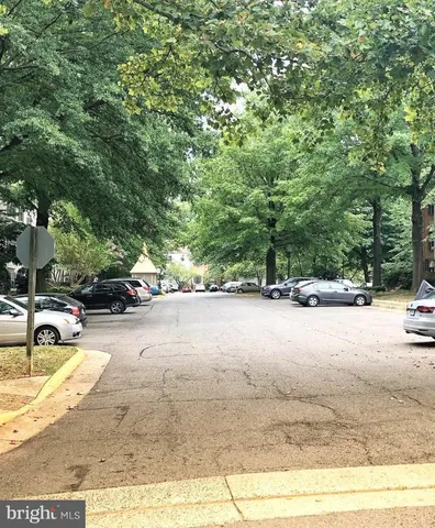 an outdoor space with trees in the background